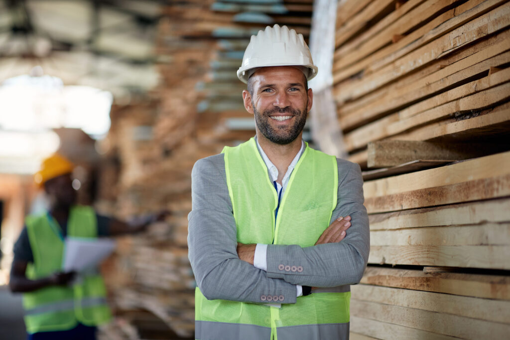 Why Working with a Lumber Yard Is Essential for Custom Home Builds 1 Contractor buying supplies at a lumber yard